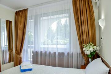 Фото номера Семейный стандарт Гостиница Пансионат Нева г. Алушта 4