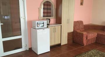 Фото номера Семейный номер с видом на море Гостевой дом Villa Violetta г. Алушта 5