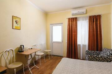 Фото номера Двухместный номер с 1 кроватью — цокольный этаж Гостиница Эдем г. Алушта 3