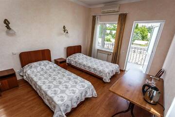 Фото номера Двухместный номер эконом-класса с 1 кроватью или 2 отдельными кроватями Гостиница Эдем г. Алушта 11