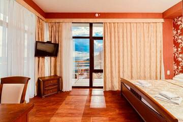 Фото номера Апартаменты с террасой Гостиница Калипсо г. Алушта 2