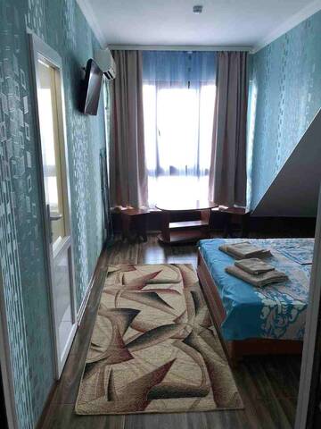 Фото номера Двухместный номер с панорамным видом на море Гостиница Ostrovok Hotel г. Алушта 13