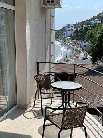 Фото номера Трехместный номер боковой с видом на море Гостиница Ostrovok Hotel г. Алушта 15