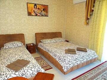 Фото номера Трехместный номер боковой с видом на море Гостиница Ostrovok Hotel г. Алушта 11