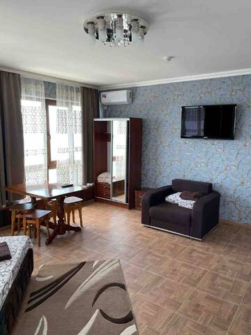 Фото номера Трехместный номер с панорамным видом на море Гостиница Ostrovok Hotel г. Алушта 15
