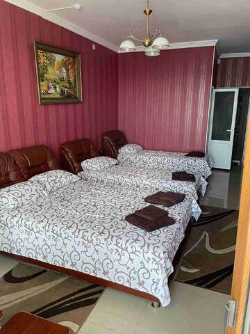 Фото номера Четырехместный номер с видом на море Гостиница Ostrovok Hotel г. Алушта 12