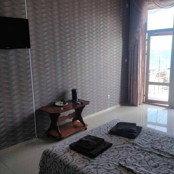 Фото номера Трехместный номер с выходом на море Гостиница Ostrovok Hotel г. Алушта 5