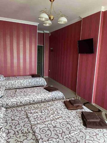 Фото номера Четырехместный номер с видом на море Гостиница Ostrovok Hotel г. Алушта 3