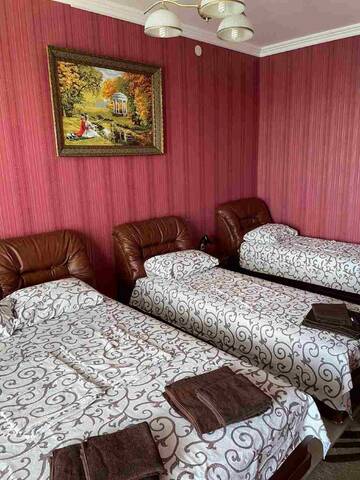 Фото номера Четырехместный номер с видом на море Гостиница Ostrovok Hotel г. Алушта 4