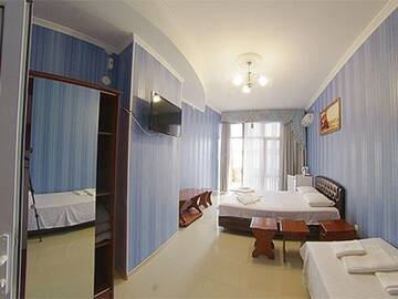 Фото номера Трехместный номер с видом на море Гостиница Ostrovok Hotel г. Алушта 4