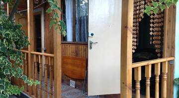 Фото номера Большой двухместный номер Гостиница Гостевой дом Blooming Garden г. Алушта 5
