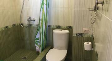 Фото номера Двухместный номер Делюкс с 1 кроватью + дополнительная кровать Гостиница Pionerskaya г. Алушта 6