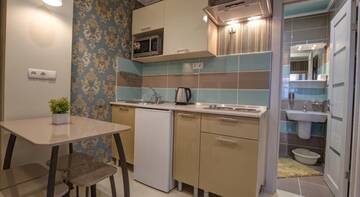 Фото номера Бирюзово-бежевый двухкомнатный Гостевой дом Guest House Lora г. Алушта 3