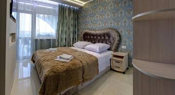 Фото номера Бирюзово-бежевый двухкомнатный Гостевой дом Guest House Lora г. Алушта 4