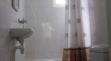 Фото номера Бюджетный двухместный номер с 1 кроватью Гостиница Guest House na Baglikova 22a г. Алушта 3