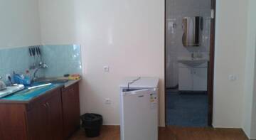 Фото номера Четырехместный номер с ванной Гостиница Guest House Oktyabrskaya 15 г. Алушта 4