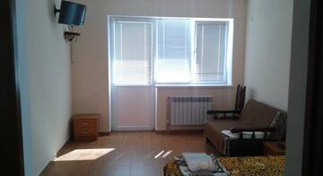Фото номера Четырехместный номер с ванной Гостиница Guest House Oktyabrskaya 15 г. Алушта 2