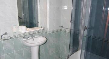 Фото номера Трехместный номер Гостевой дом Inn na Oktyabrskoy г. Алушта 7