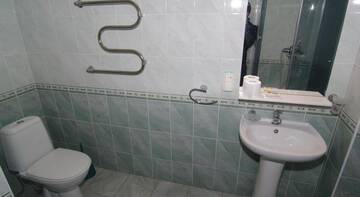 Фото номера Трехместный номер -люкс Гостевой дом Inn na Oktyabrskoy г. Алушта 4