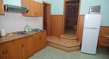 Фото номера Трехместный номер с видом на море Гостевой дом Inn na Oktyabrskoy г. Алушта 7