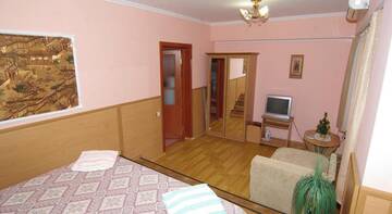 Фото номера Трехместный номер Гостевой дом Inn na Oktyabrskoy г. Алушта 6
