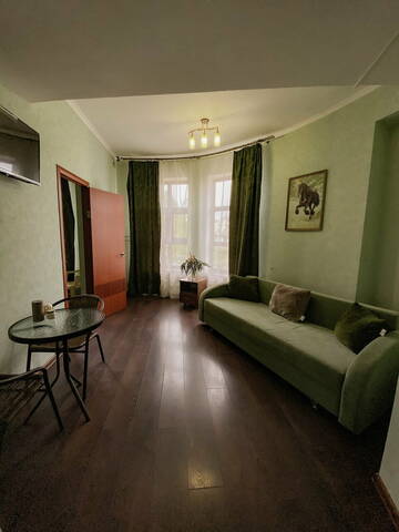 Фото номера Улучшенный четырехместный номер Гостиница Кинг г. Алушта 2