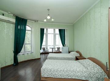 Фото номера Бюджетный двухместный номер с 2 отдельными кроватями Гостиница Кинг г. Алушта 4