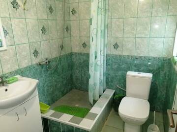 Фото номера Двухместный номер Делюкс с 1 кроватью или 2 отдельными кроватями Гостевой дом Волна г. Алушта 2