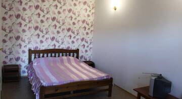 Фото номера Классический трехместный номер Гостиница Kiparisoviy Dvorik Guest House г. Алушта 6