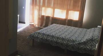 Фото номера Двухместный номер с 1 кроватью и видом на сад Гостевой дом Villa Mindalnaya Volna г. Алушта 2