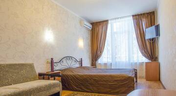 Фото номера Двухместный номер с 1 кроватью и балконом Гостиница Vostorg Mini Hotel г. Алушта 10