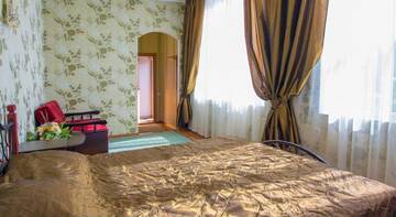 Фото номера Двухместный номер с 1 кроватью и балконом Гостиница Vostorg Mini Hotel г. Алушта 7