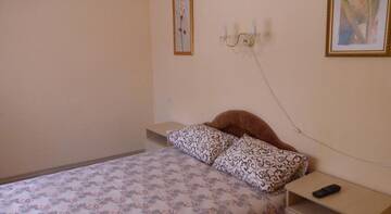 Фото номера Четырехместный номер Гостиница Guest House Kollektivnaya Street г. Алушта 4
