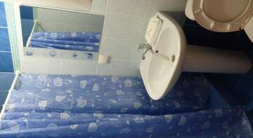 Фото номера Четырехместный номер Гостиница Guest House Kollektivnaya Street г. Алушта 10