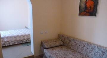 Фото номера Четырехместный номер Гостиница Guest House Kollektivnaya Street г. Алушта 8