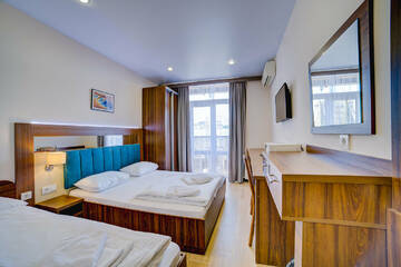 Фото номера Трехместный номер Делюкс Гостиница Южный берег г. Алушта 2