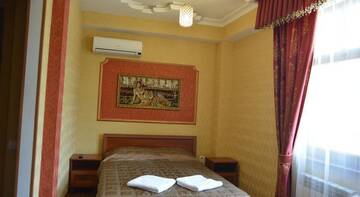Фото номера Классический трехместный номер Гостиница Guest House na Gorkogo г. Алушта 7