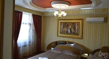 Фото номера Классический трехместный номер Гостиница Guest House na Gorkogo г. Алушта 10