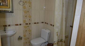 Фото номера Классический трехместный номер Гостиница Guest House na Gorkogo г. Алушта 12