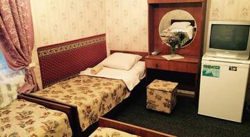 Фото номера Стандартный четырехместный номер Гостиница Pansionat Kaissa г. Алушта 4