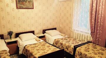 Фото номера Стандартный четырехместный номер Гостиница Pansionat Kaissa г. Алушта 2