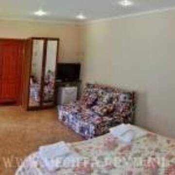 Фото номера Трехместный номер с террасой Гостевой дом Мечта г. Алушта 4