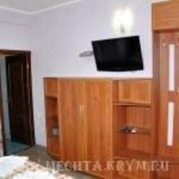 Фото номера Стандартный двухместный номер с 2 отдельными кроватями и видом на море Гостевой дом Мечта г. Алушта 12